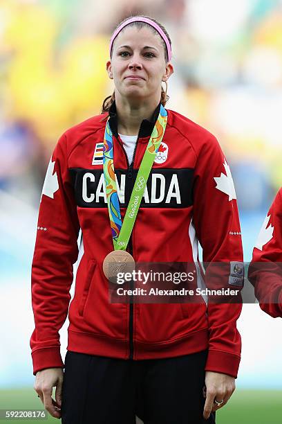 Canadian goalkeeper Stephanie Labbe of Canada celebrates with her medal following her teams victory during the Women's Olympic Football Bronze Medal...