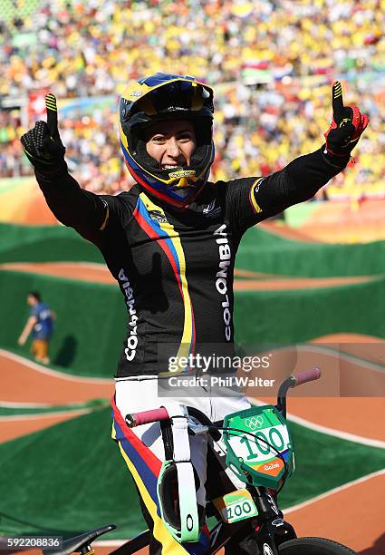 Mariana Pajon of Colombia celebrates after winning the gold during the Women's Final on day 14 of the Rio 2016 Olympic Games at the Olympic BMX...