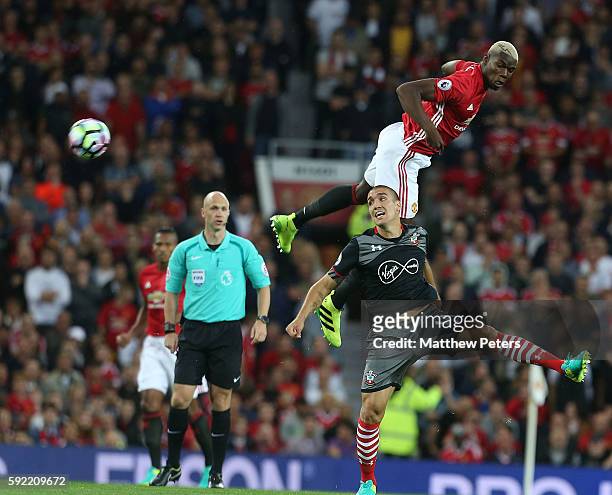 Paul Pogba of Manchester United in action with Oriol Romeu of Southampton during the Premier League match between Manchester United and Southampton...