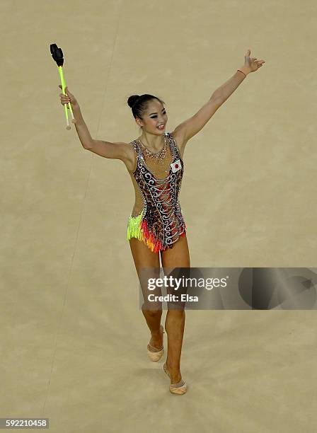 Kaho Minagawa of Japan celebrates after her club routine during the Rhythmic Gymnastics Individual All-Around on August 19, 2016 at Rio Olympic Arena...