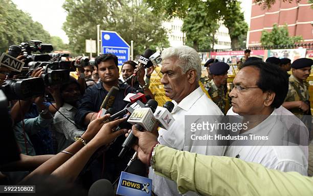 Aam Adami Party Delhi MLAs Madan Lal and Anil Bajpai leave after attending the hearing at Election Commission of India over office of profit row at...