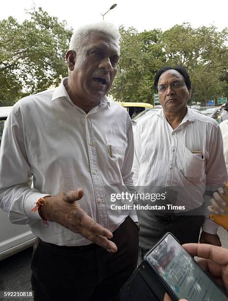 Aam Adami Party Delhi MLAs Madan Lal and Anil Bajpai leave after attending the hearing at Election Commission of India over office of profit row at...