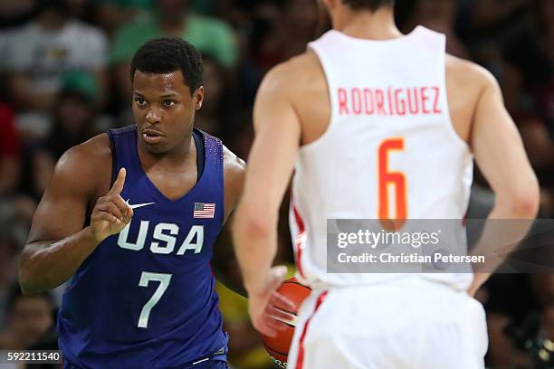 Kyle Lowry of United States handles the ball against Sergio Rodriguez of Spain during the Men's Semifinal match on Day 14 of the Rio 2016 Olympic...