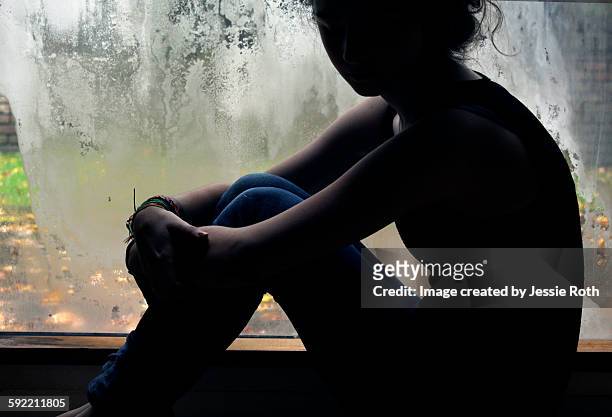 silhouette girl by window - rye new york stock pictures, royalty-free photos & images