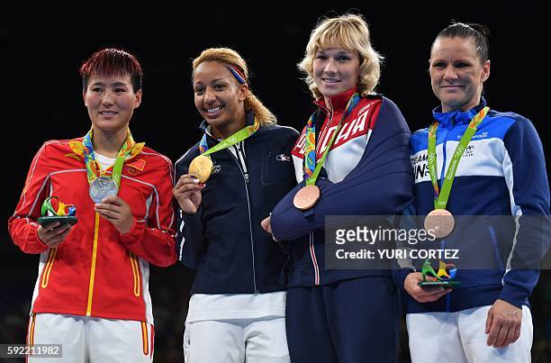 China's Yin Junhua, France's Estelle Mossely, Russia's Anastasiia Beliakova and Finland's Mira Potkonen pose on the podium with their medals...