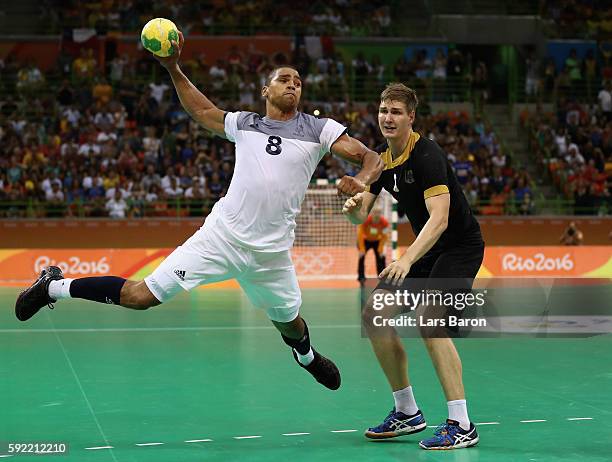 Daniel Narcisse of France shoots the winning goal during the Men's Handball Semifinal match between France and Germany on Day 14 of the Rio 2016...