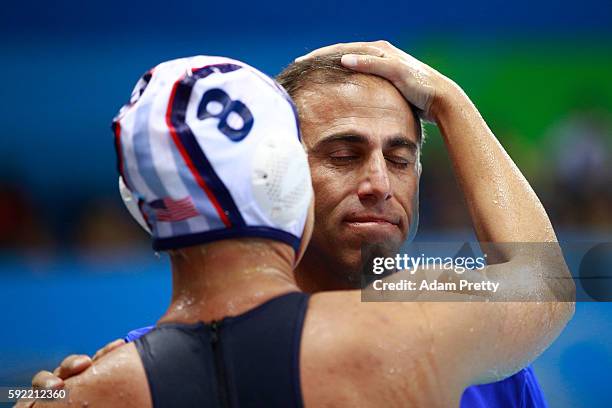 Adam Krikorian, coach of the United States, celebrates with Kiley Neushul of United States after winning the Women's Water Polo Gold Medal...