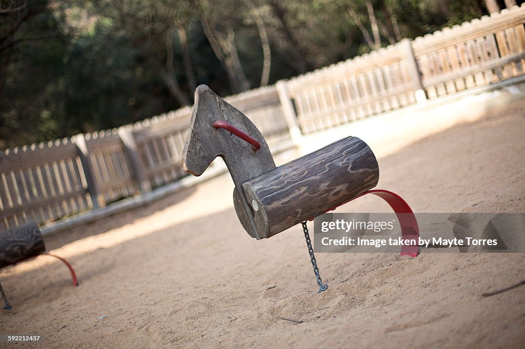 Wodden horse toy at playground