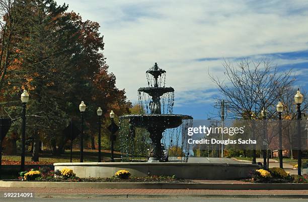 fountain at carmel indiana in november 2015 - carmel indiana stock pictures, royalty-free photos & images