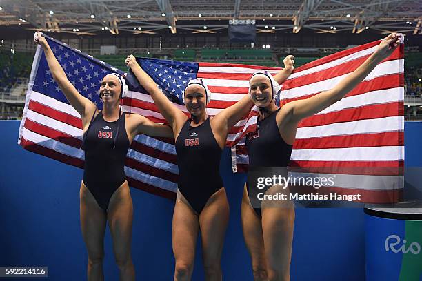 The United States celebrate winning the Women's Water Polo Gold Medal match between the United States and Italy on Day 14 of the Rio 2016 Olympic...