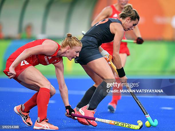 Britain's Nicola White vies with Netherlands' Ellen Hoog during the women's Gold medal hockey Netherlands vs Britain match of the Rio 2016 Olympics...