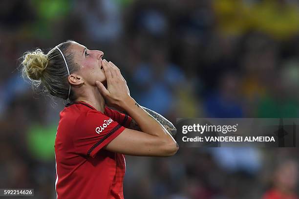 Germany's striker Anja Mittag reacts after failing to score during the Rio 2016 Olympic Games women's football Gold medal match at the Maracana...