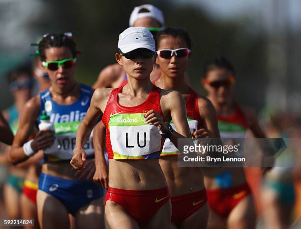 Xiuzhi Lu of China competes in the Women's 20km Walk final on Day 14 of the Rio 2016 Olympic Games at Pontal on August 19, 2016 in Rio de Janeiro,...