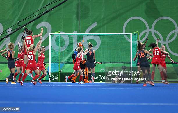 Great Britain players celebrate the third goal scored by Nicola White during the Women's Gold Medal Match against the Netherlands on Day 14 of the...