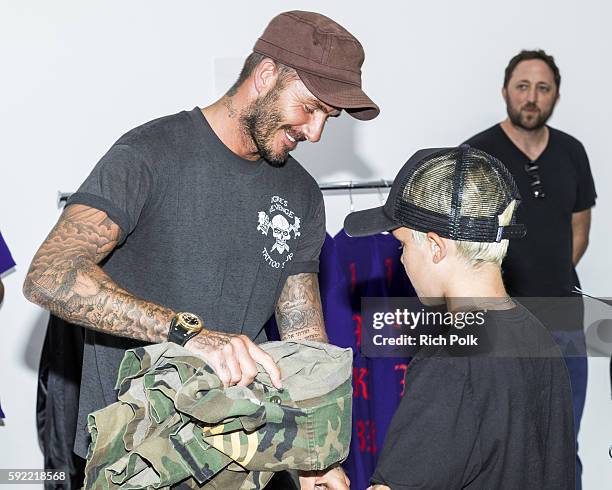 Soccer player David Beckham and son Cruz David Beckham at the Kanye West temporary PABLO store at on August 19, 2016 in Los Angeles, CA.