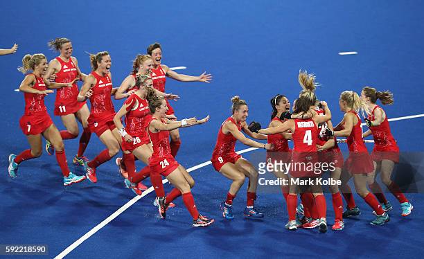 Great Britain players celebrating winning the shoot out against Netherlands to win the Women's Gold Medal Match on Day 14 of the Rio 2016 Olympic...