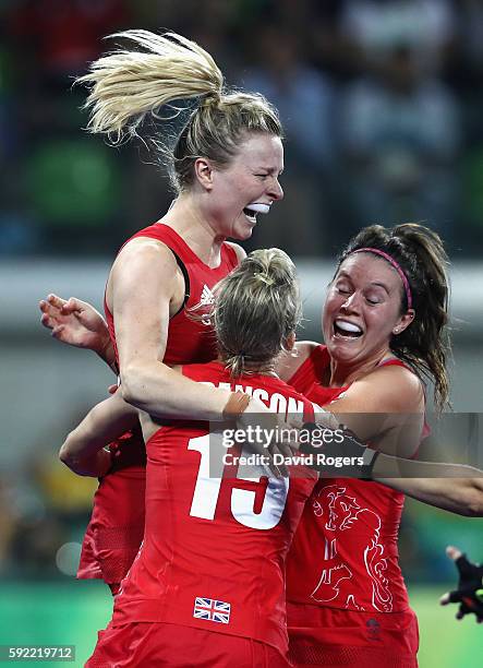 Hollie Webb of Great Britain celebrates after scoring the winning penalty against the Netherlands during the Women's Gold Medal Match on Day 14 of...
