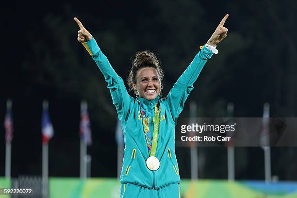 Gold medalist Chloe Esposito of Australia poses on the podium during the medal ceremony for the Women's Modern Pentathlon on Day 14 of the Rio 2016...