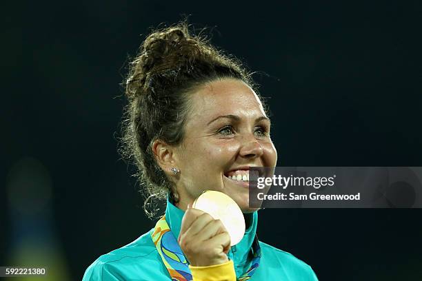 Gold medalist Chloe Esposito of Australia poses on the podium during the medal ceremony for the Women's Modern Pentathlon on Day 14 of the Rio 2016...