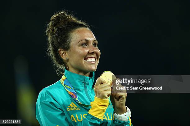 Gold medalist Chloe Esposito of Australia poses on the podium during the medal ceremony for the Women's Modern Pentathlon on Day 14 of the Rio 2016...