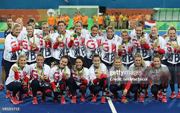 Great Britain pose after winning a penalty shoot out during the Women's Hockey final between Great Britain and the Netherlands on day 14 at Olympic...