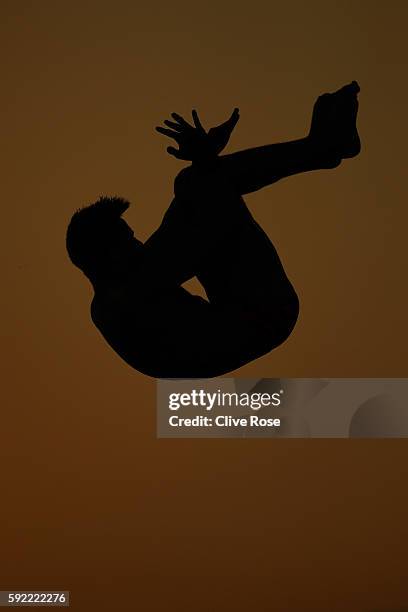 Steele Johnson of the United States competes during the Diving Men's 10m Platform Preliminary on Day 14 of the Rio 2016 Olympic Games at the Maria...