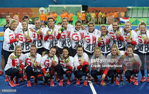 Great Britain pose after winning a penalty shoot out during the Women's Hockey final between Great Britain and the Netherlands on day 14 at Olympic...