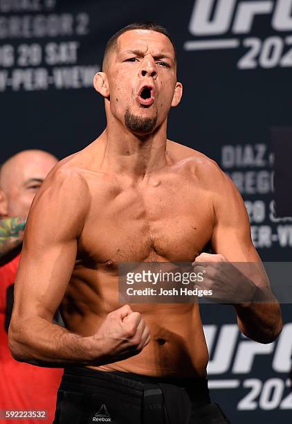 Nate Diaz reacts to the crowd during the UFC 202 weigh-in at the MGM Grand Hotel & Casino on August 19, 2016 in Las Vegas, Nevada.