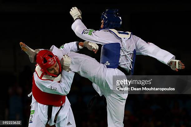 Steven Lopez of the United States competes against Hayder Shkara of Australia in the Men's Taekwondo -80kg Repechage on Day 14 of the Rio 2016...