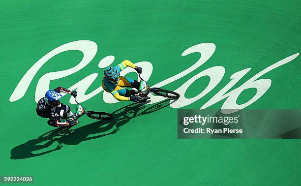 Anthony Dean of Australia and Corben Sharrah of the United States compete during the Men's BMX Semi Finals on day 14 of the Rio 2016 Olympic Games at...