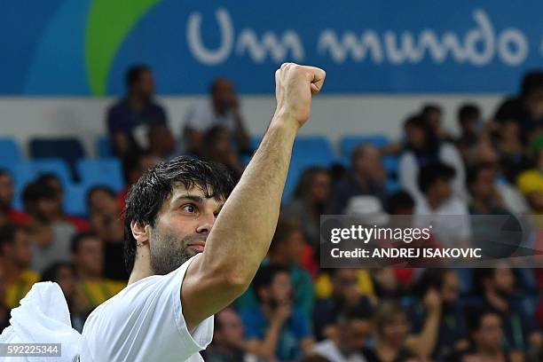 Serbia's guard Milos Teodosic celebrates after winning a Men's semifinal basketball match between Australia and Serbia at the Carioca Arena 1 in Rio...