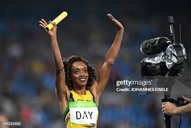 Jamaica's Christine Day celebrates after the Women's 4x400m Relay Round 1 during the athletics event at the Rio 2016 Olympic Games at the Olympic...