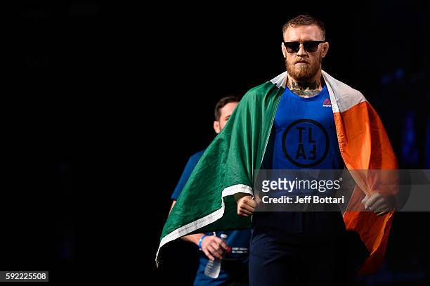 Conor McGregor of Ireland steps on stage during the UFC 202 weigh-in at the MGM Grand Marquee Ballroom on August 19, 2016 in Las Vegas, Nevada.
