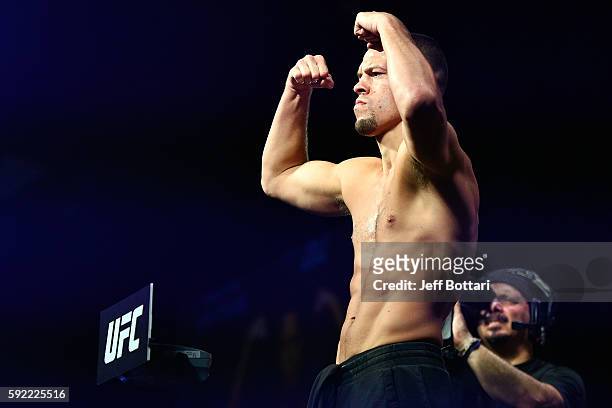 Nate Diaz steps on the scale during the UFC 202 weigh-in at the MGM Grand Marquee Ballroom on August 19, 2016 in Las Vegas, Nevada.