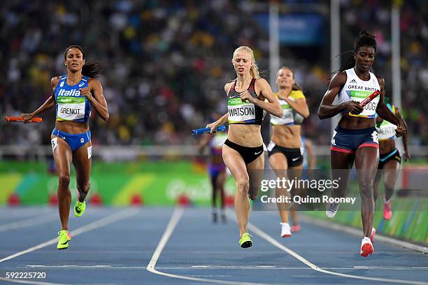 Sage Watson of Canada and Christine Ohuruogu of Great Britain compete in Round One of the Women's 4 x 400m Relay on Day 14 of the Rio 2016 Olympic...