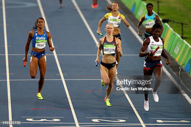 Sage Watson of Canada and Christine Ohuruogu of Great Britain compete in Round One of the Women's 4 x 400m Relay on Day 14 of the Rio 2016 Olympic...