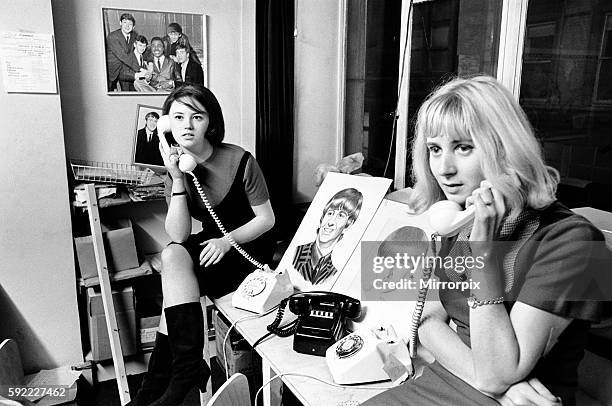 Beatles Fan Club Office, 1st December 1964. Both lines are busy, as callers enquire after Ringo Starr's health. On the phone are Bettina Rose and...