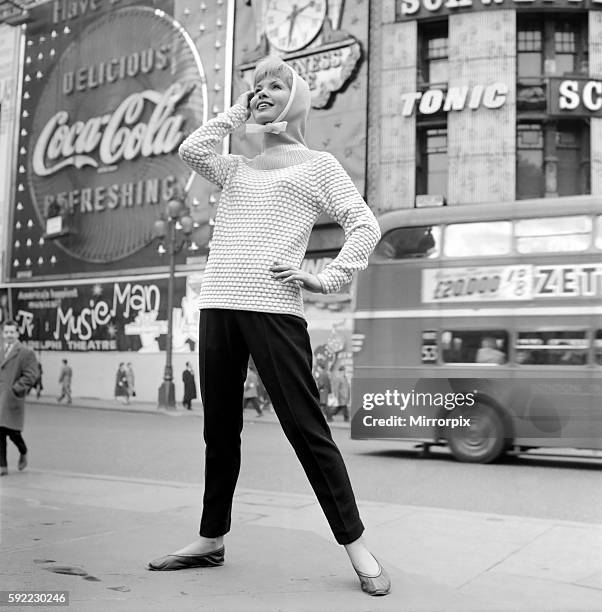 Playfair set the fashion in knitwear with the Autumn Preview of sweaters, afternoon wear and apres-ski outfits shown in London today at the Cafe...