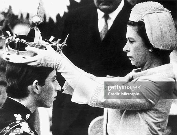 Queen Elizabeth II places the coronet on the head of Prince Charles in July 1969 The Investiture of Prince Charles at Caernarvon