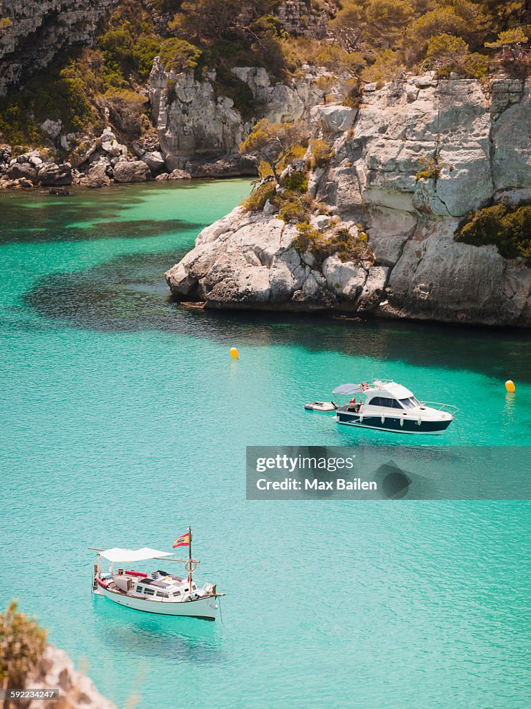 Elevated view of two boats anchored in bay, Menorca, Balearic islands, Spain