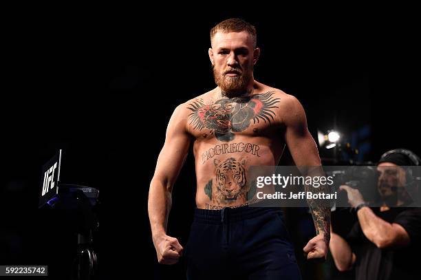 Conor McGregor of Ireland steps off the scale during the UFC 202 weigh-in at the MGM Grand Marquee Ballroom on August 19, 2016 in Las Vegas, Nevada.