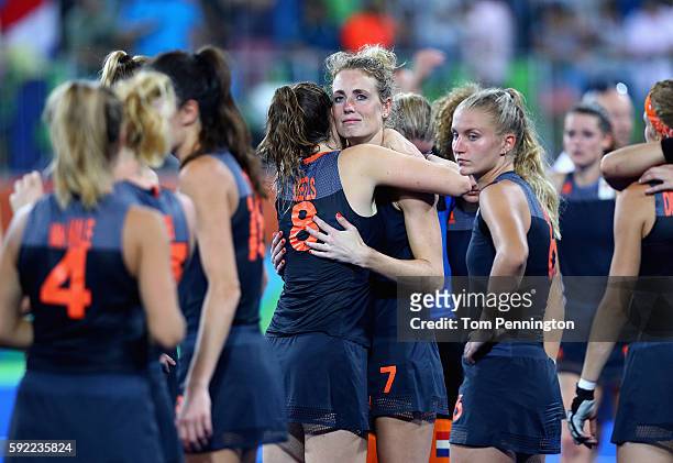 Marloes Keetels and Willemijn Bos of Netherlands react after being defeated by Great Britain in the Women's Gold Medal Match on Day 14 of the Rio...