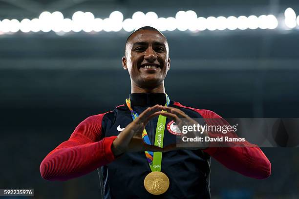 Gold medalist, Ashton Eaton of the United States poses on the podium during the medal ceremony for the Men's Decathlon on Day 14 of the Rio 2016...