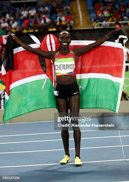 Vivian Jepkemoi Cheruiyot of Kenya celebrates winning the Women's 5000m Final and setting a new Olympic record of 14:26.17 on Day 14 of the Rio 2016...