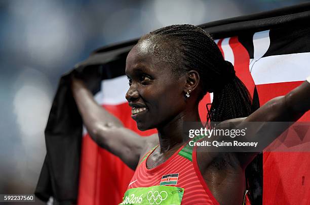 Vivian Jepkemoi Cheruiyot of Kenya celebrates winning the Women's 5000m Final and setting a new Olympic record of 14:26.17 on Day 14 of the Rio 2016...