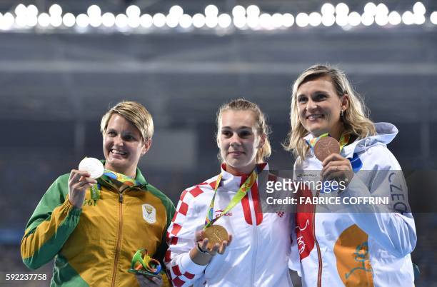 South Africa's Sunette Viljoen , Croatia's Sara Kolak and Czech Republic's Barbora Spotakova pose during the podium ceremony for the Women's Javelin...