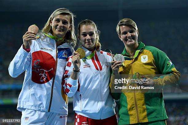 Silver medalist, Sunette Viljoen of South Africa, gold medalist, Sara Kolak of Croatia, and bronze medalist Barbora Spotakova of the Czech Republic,...