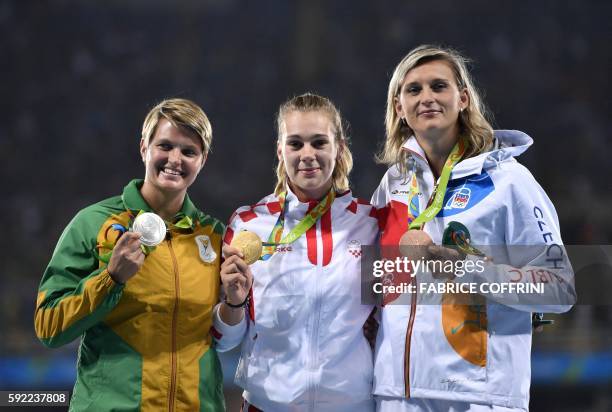 South Africa's Sunette Viljoen , Croatia's Sara Kolak and Czech Republic's Barbora Spotakova pose during the podium ceremony for the Women's Javelin...