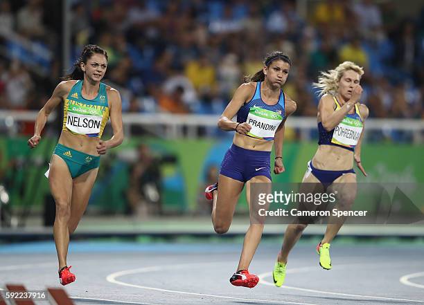Ella Nelson of Australia, Jenna Prandini of the United States and Natalia Pohrebniak of Ukraine compete in the Women's 200m semifinal on Day 11 of...