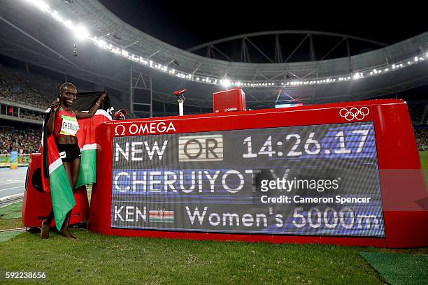 Vivian Jepkemoi Cheruiyot of Kenya celebrates winning the Women's 5000m Final and setting a new Olympic record of 14:26.17 on Day 14 of the Rio 2016...